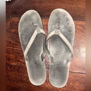 Worn rainbow sandals